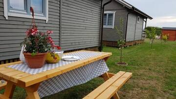 Фото номера Шале с двумя спальнями Шале Na Fali Domki Letniskowe г. Żarnowska 65
